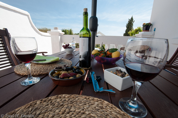 The welcome package includes wine, olives, fruit, nuts.